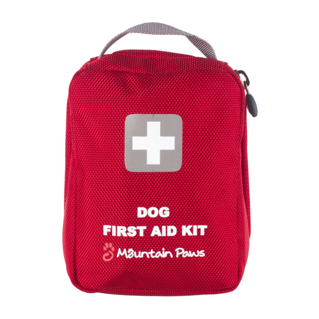Close up of compact first aid kit for dogs with red cross symbol
