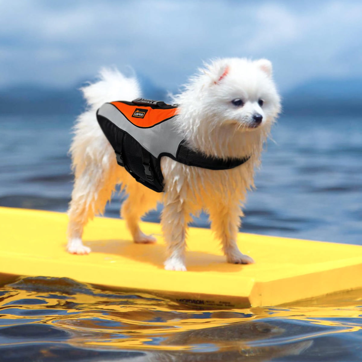 Dog life jacket with reflective strips and rescue handle