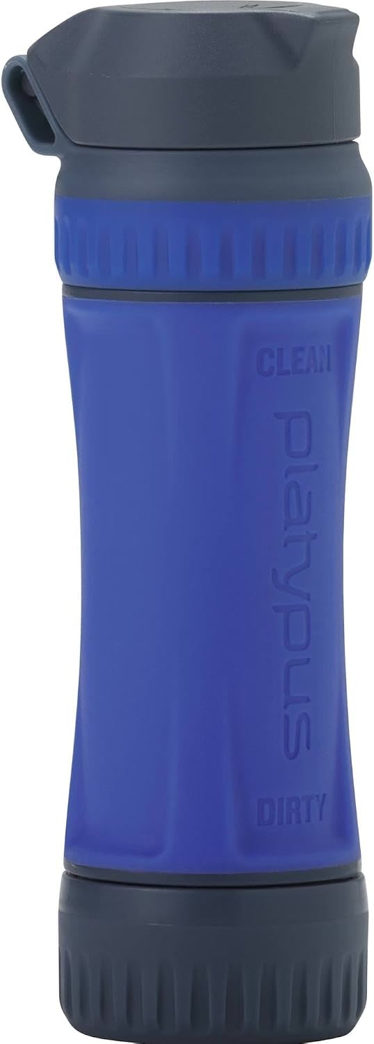 Platypus QuickDraw squeeze filter connected to a water bottle on a rocky riverbank