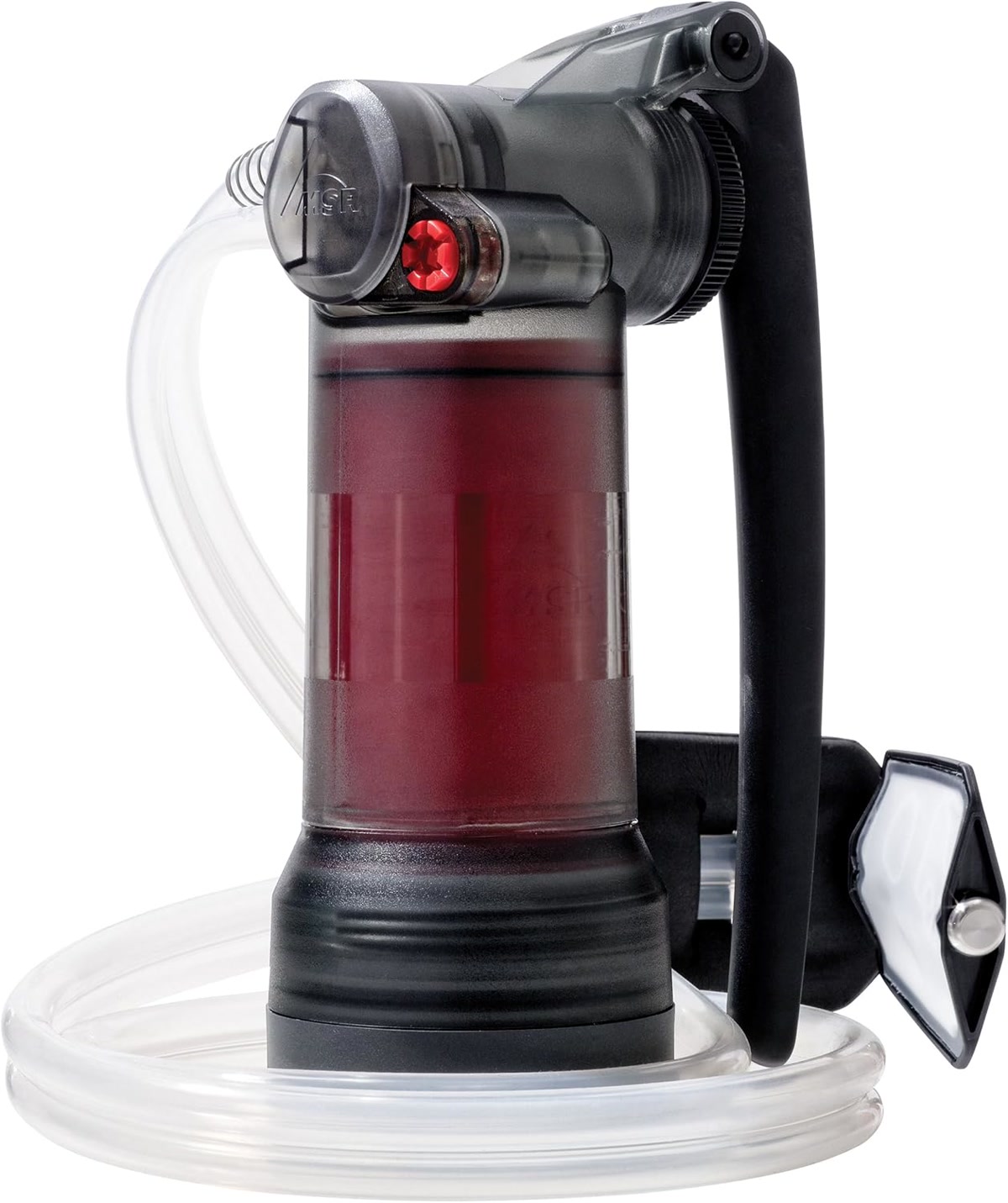 Winter backpacker melting snow for water near a frozen stream with a insulated filter pouch