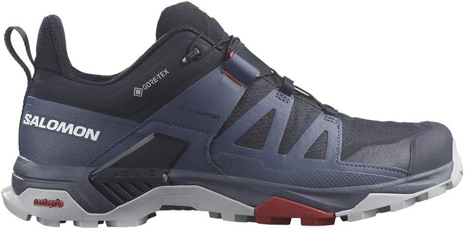 Salomon X Ultra 4 hiking boot on a rocky stream crossing with water flowing around it